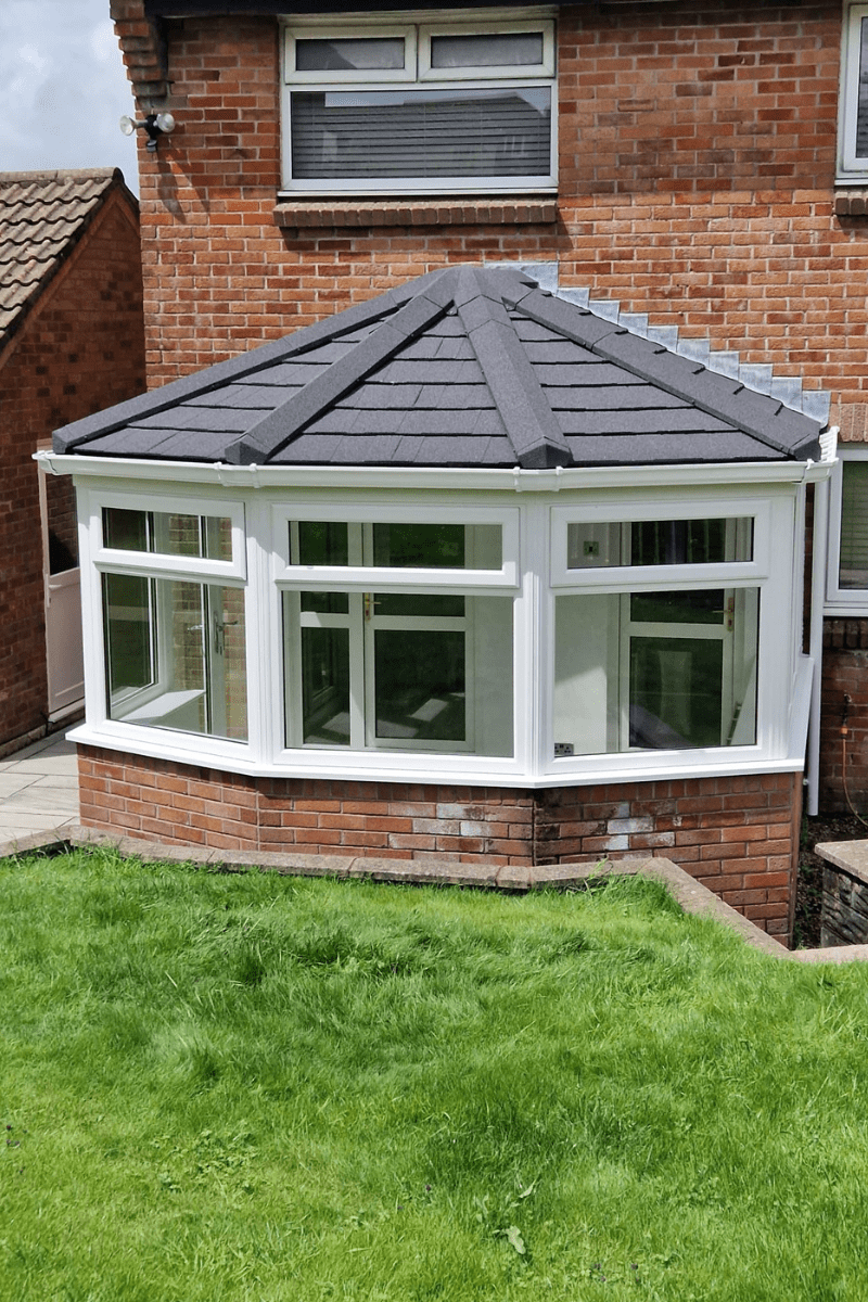 Photo of a conservatory that we spray painted white