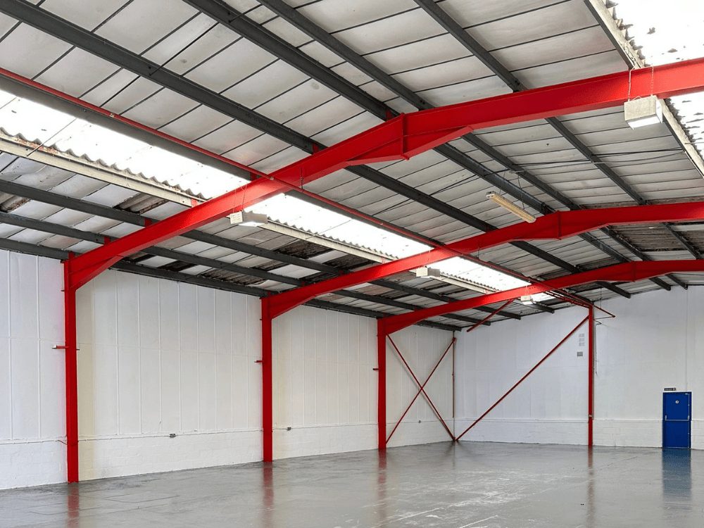 Our commercial warehouse sprayers sprayed the inside of this unit red and white