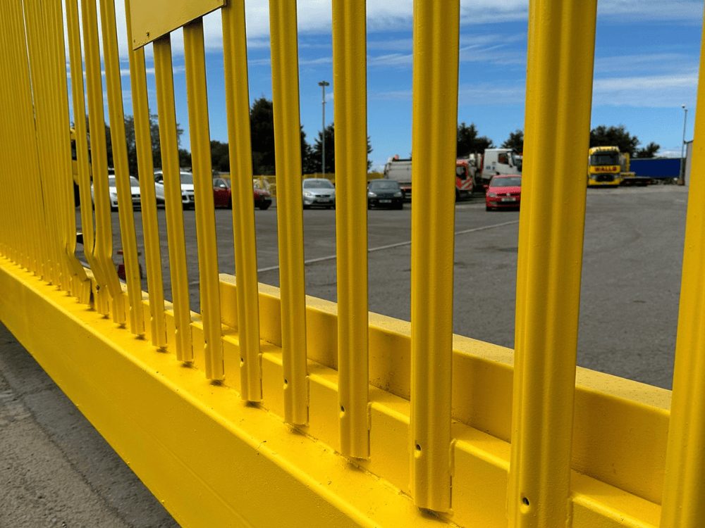 Security fencing that our paint spraying company sprayed yellow