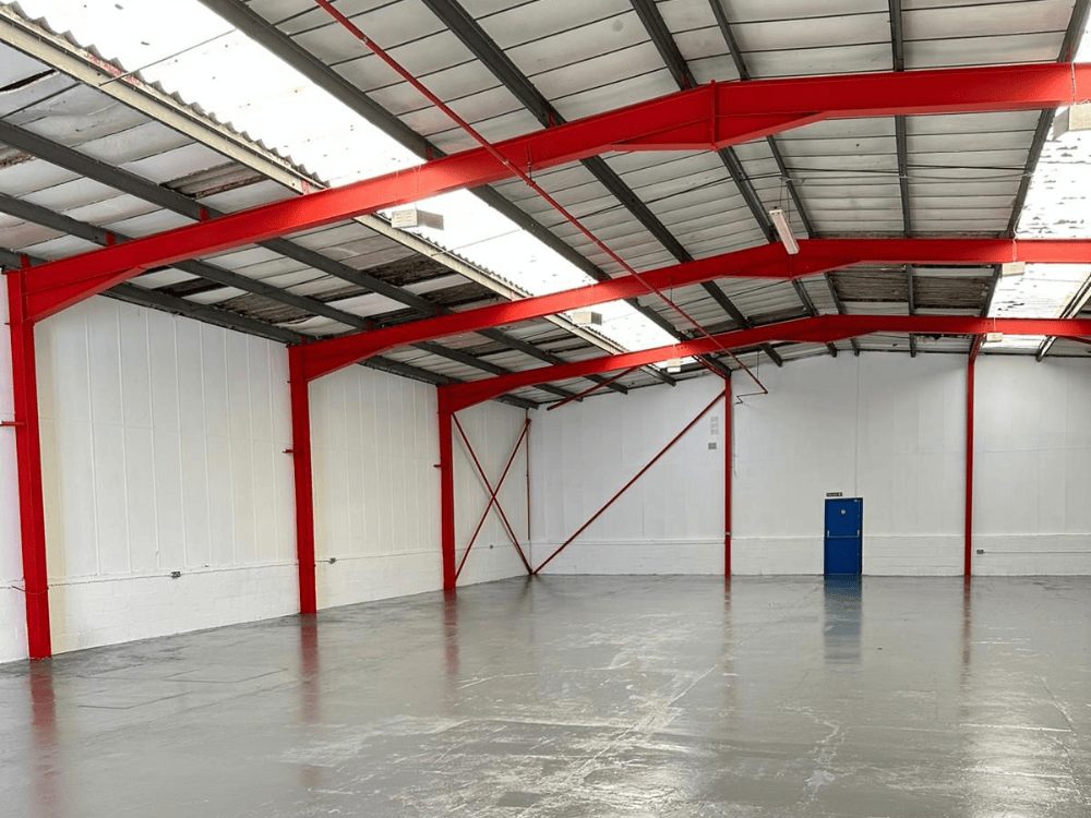 The inside of a commercial unit that we sprayed red and white