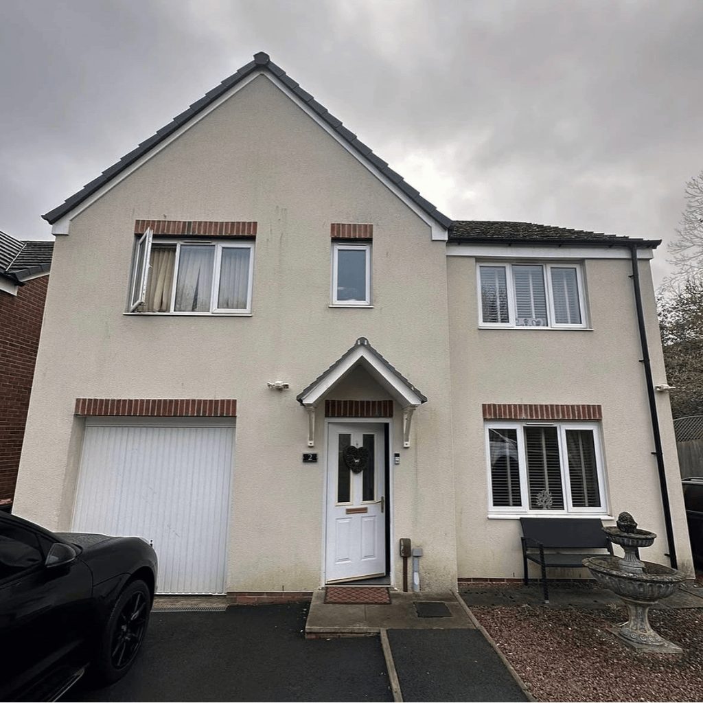 Before photo of a full-house UPVC spraying project in Cardiff